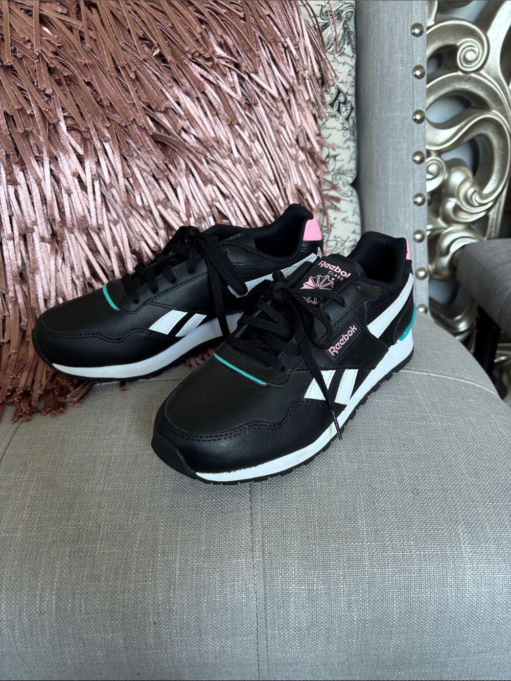 Reebok Black Athletic Sneakers with White Stripes and Pink & Teal Accents